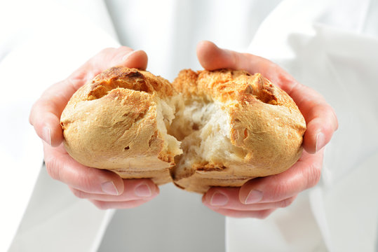 mani con pane spezzato - offertorio