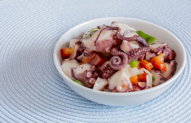 Octopus salad with vinaigrette sauce.