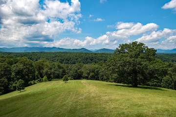 Fototapeta premium Meadows With Mountains