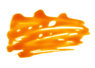 Liquid caramel isolated on a white background