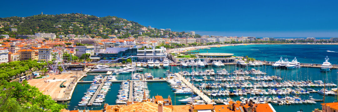 Coastline view on french riviera with yachts in Cannes city center.
