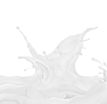 Splashes of milk or cream on white background