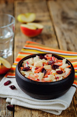 Carrot apple dried cranberries slaw