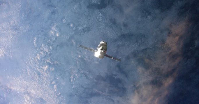 Satellite flies over Earth