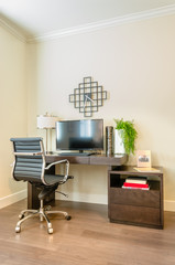 Modern office interior with leather chair and wooden furniture. Interior design.