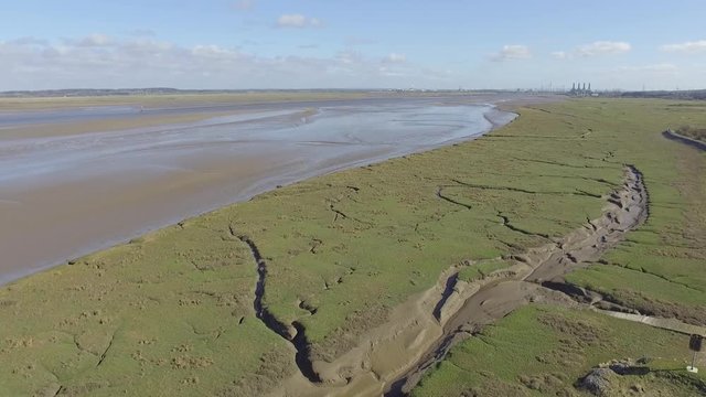 Aerial footage flying over the mouth of Deeside Estuary.