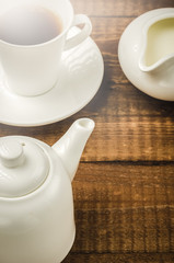 white ware for coffee on a wooden table/elements of kitchen white ware for coffee