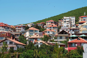Panorama of the beautiful houses and red roofs of the Balkan mountains nature Bulgaria summer resort