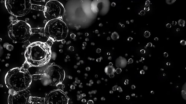 Glassy DNA molecule model against black background, shallow focus. Biology, medicine or genetics related loopable 4K animation