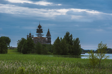 Fototapeta premium Kizhi Island, Russia. Ancient wooden religious architecture. Summer landscape