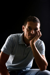 portrai of a man with black background