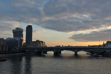 Amazing sunset Cityscape from Millennium Bridge and Thames River, London, Great Britain