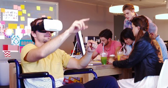 Executive using virtual reality headset on wheelchair