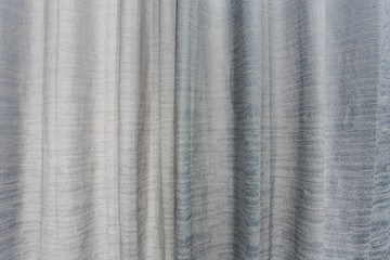 Fabric of gray curtains in the bedroom.