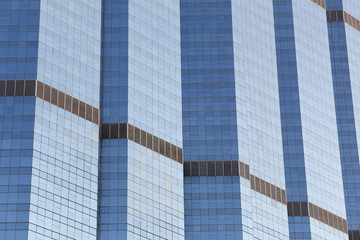 Wall of tall building or glass of skyscraper background.