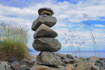 The stones, stacked in a tower on the shore of lake Baikal