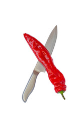 Red hot pepper and sharp knife on a white background