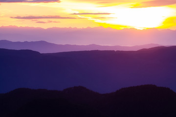 Sunset over layers of mountains