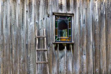 Old barn with stained glass window