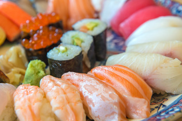 Salmon raw sashimi sushi with shrimp on plate, japanese food
