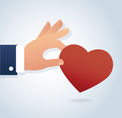 hand holding the red heart vector 