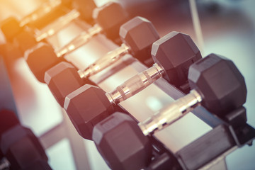 dumbbells in the gym at sports club for exercise and Bodybuilding