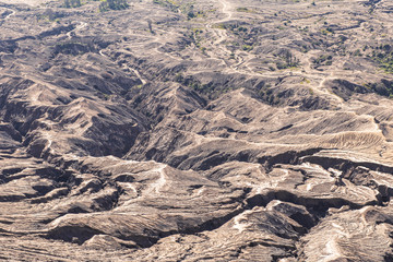 Fototapeta premium Layer Volcanic ash as sand ground of Mount Bromo volcano (Gunung Bromo) in Bromo Tengger Semeru National Park, East Java, Indonesia