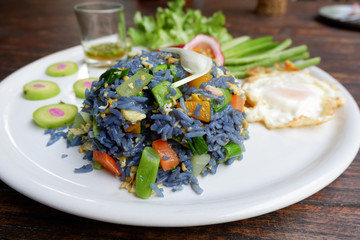 Close up Fried Blue rice from petal of butterfly pea flowers