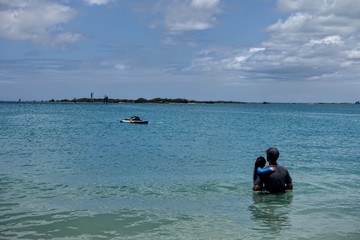 Looking at the man sleeping in waterboard