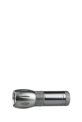 Metal flashlight over white background