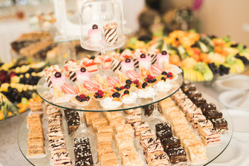 Different kinds of baked sweets on a buffet