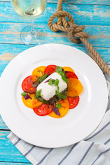 Colourful slices of cheese and tomato