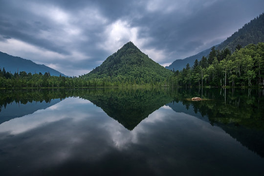 Mountain Cap of Monomakh reflected in the lake