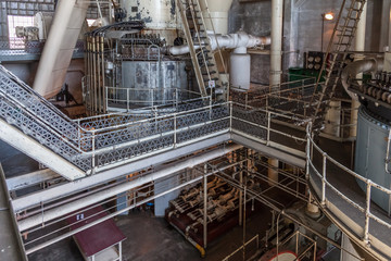 walkways and ladders in abandoned steam plant factory