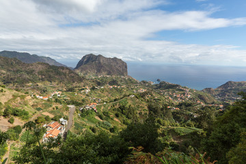 Fototapeta na wymiar Eagles Rock and Porto da Cruz on the north coast of Madeira , Portugal