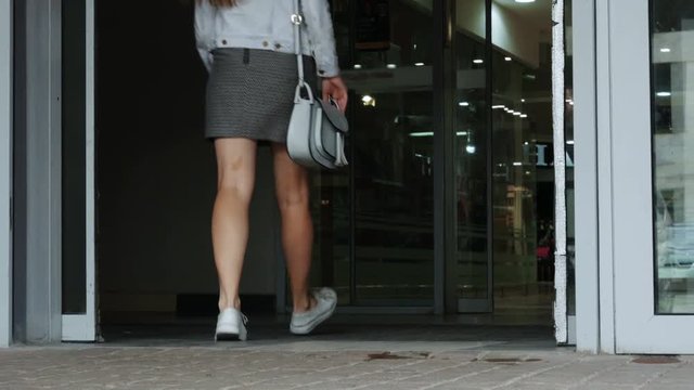 Shopping Mall Entrance. Woman Walking Through The Door At Supermarket