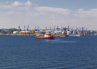 A tug ship in the blue sea