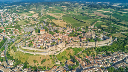 Aerial top view of Carcassonne medieval city and fortress castle from above, Sourthern France
