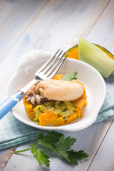 sepia with steamed pumpkins and leek salad, selective focus
