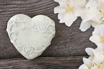 Heart and wooden background