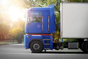 Side view of blue American cargo truck