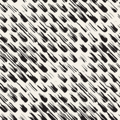 Vector seamless pattern with brush stripes and strokes. Black and white background with ink elements. Hand painted grunge texture.