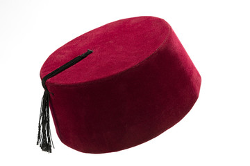 Traditional Turkish hat called fez isolated on white background.   