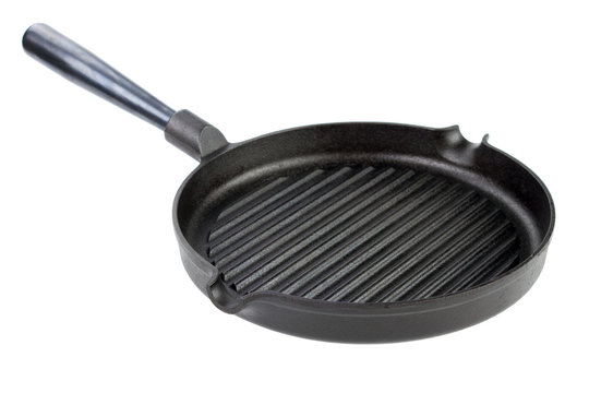 Cast iron grill pan with carbon steel handle , isolated on white background