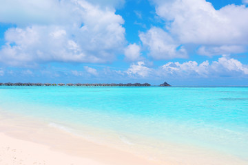 Modern beach houses on piles at tropical resort