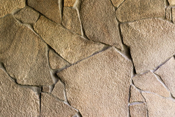Interior decoration of walls with artificial stone.