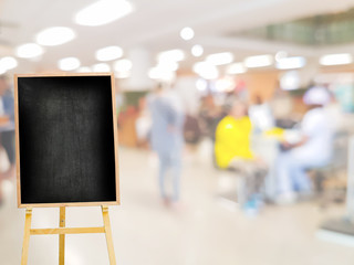 vintage menu blackboard on the background of blur hospital interior