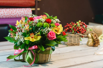 Bouquet of Tulips, roses, wildflowers wooden table, spase for text