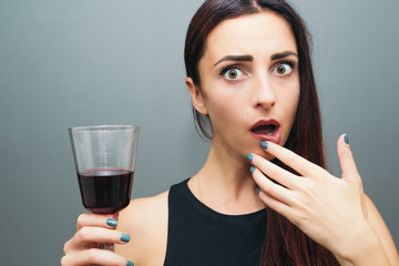 Beautiful girl with a glass of wine