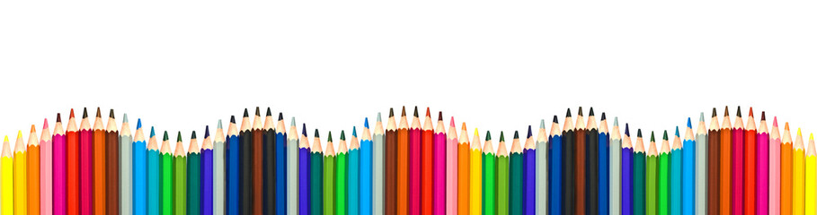 Wave of colorful wooden pencils in a row isolated on white background, panoramic background, back...